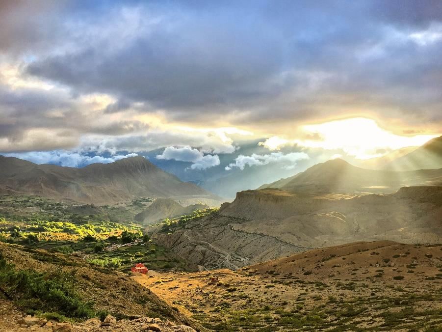 Evening light over a terraced valley in the Himalaya